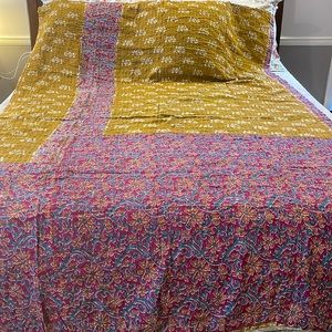 Exquisite hand quilted Kantha throws. Vibrant earth tones, recycled fabrics.